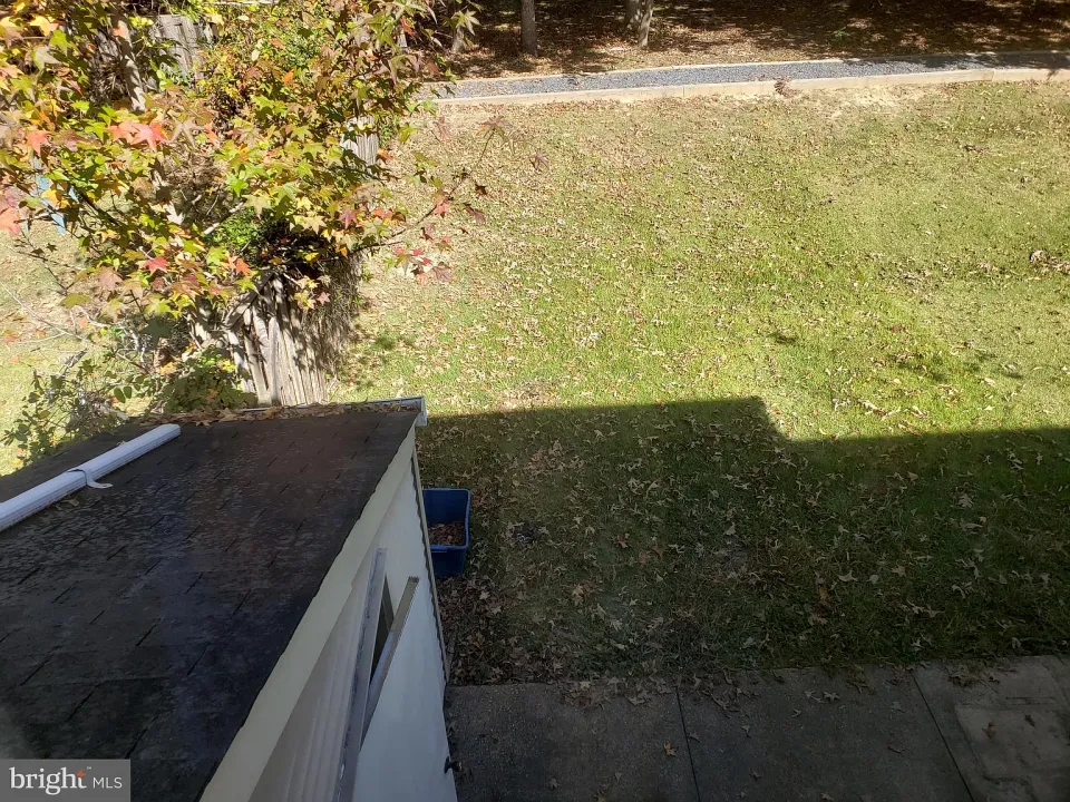 Backyard lawn and patio viewed from the townhome
